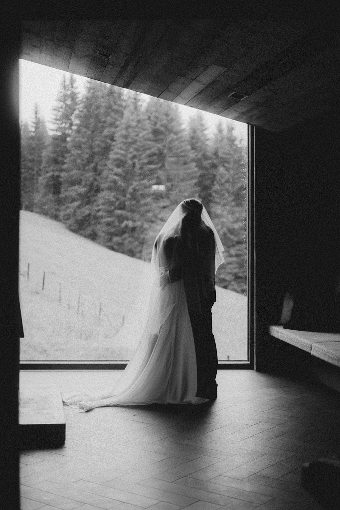 Bridal couple during an intimate couple shoot at their mountain wedding