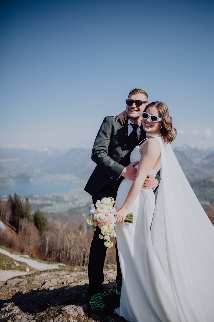 Happy bridal couple at their mountain wedding on the summit