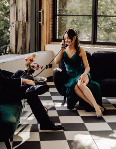 Guests recording their messages to the bride and groom with the guest phone