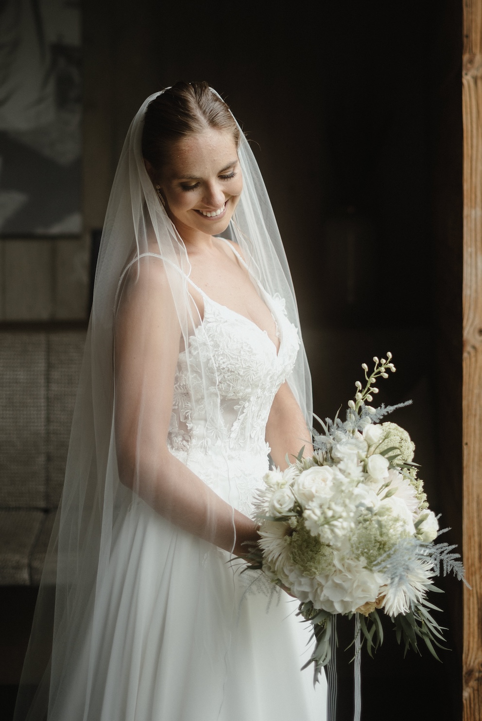 Intimate wedding Austria Allgäu wedding on the mountain Alps wedding planner Bride at her small wedding in the mountains with Wedding Planner