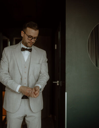 Groom on the morning of his mountain wedding in the Austrian Alps