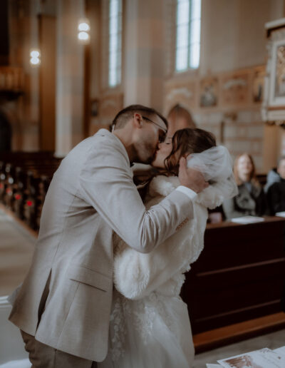 Bridal couple after the ring exchange in the church in Tyrol