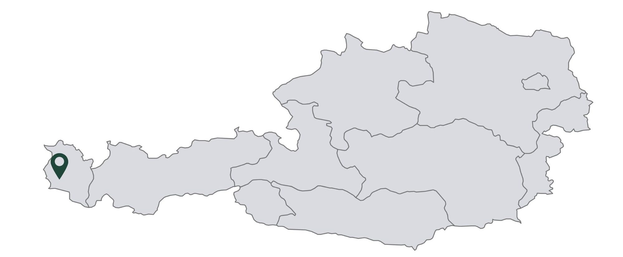 Karte von Österreich mit einer Standortnadel, die einen Ort im äußersten Westen markiert, perfekt für die Planung Ihrer Traum-Berghochzeit.